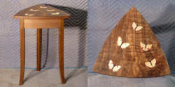Table with 5 inlaid butterflies, walnut veneers and solids, by Bruce Powell