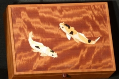 Treasure box with curly cherry top inlaid with koi fish.  By Bruce Powell