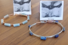 Bracelets by Jane Y. Chang. Left is Sunset Lakes of copper and Amazonite. Right is Haybales of silver and Lapis.