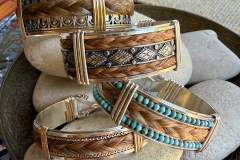 4 bracelets of-Sterling silver and horsehair, by Judy Dailey