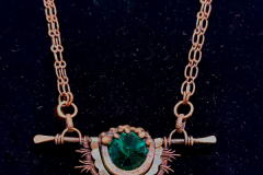 Necklace of Copper and Sterling silver with emerald green Swarovski crystal, by Judy Dailey