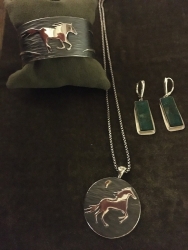 Horse cuff and pendant and Peruvian opal earrings by Michael Borofka, sterling silver