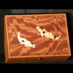 Treasure box with curly cherry top inlaid with koi fish. By Bruce Powell
