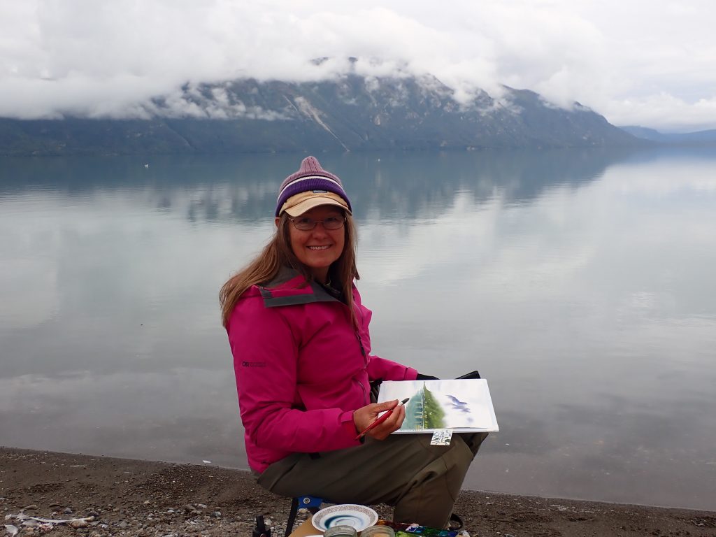 Here I am painting Mount Katolinat in Alaska. Photo by Tom Johnson